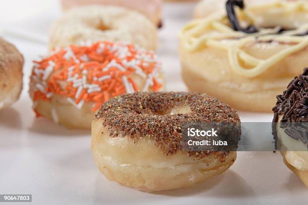 Rosquillas Foto de stock y más banco de imágenes de Alimento - Alimento, Buñuelo en forma de rosca, Canela - Especia