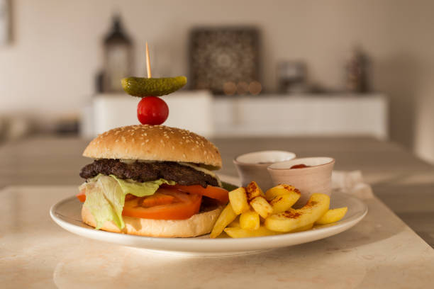 istock Hamburger with french fries 906484458