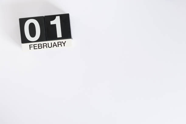istock February 1st. Day 1 of month, calendar on white background. Winter time. Empty space for text 906503388