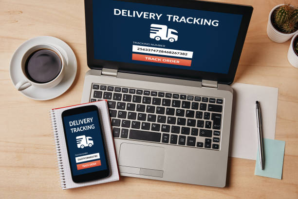 istock Delivery tracking concept on laptop and smartphone screen 906506914