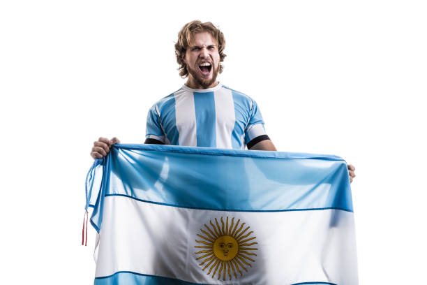 istock Argentinian male athlete / fan celebrating on white background 906508256