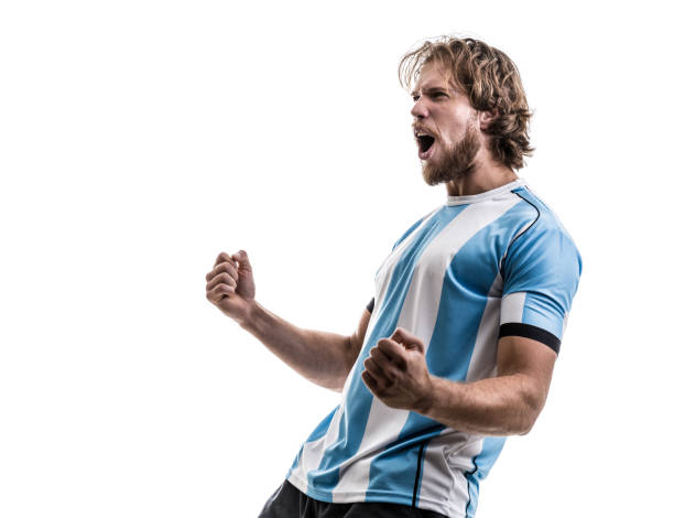 argentinian male athlete / fan celebrating on white background - argentina imagens e fotografias de stock