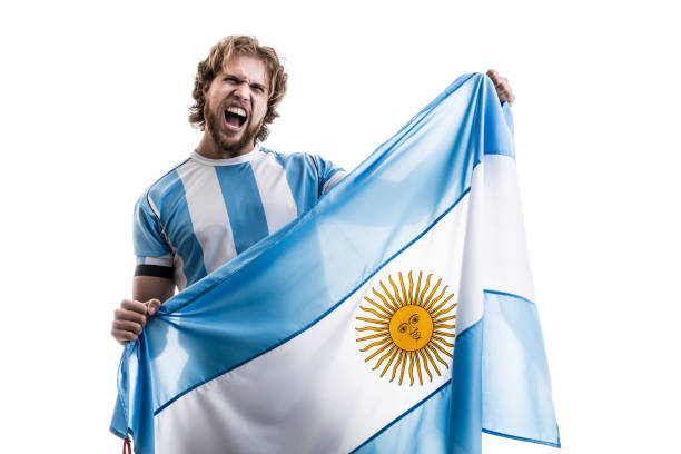 istock Argentinian male athlete / fan celebrating on white background 906509058