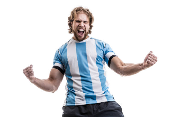istock Argentinian male athlete / fan celebrating on white background 906509068