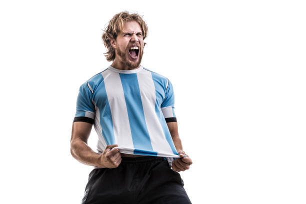 argentinian male athlete / fan celebrating on white background - fan sport football male imagens e fotografias de stock