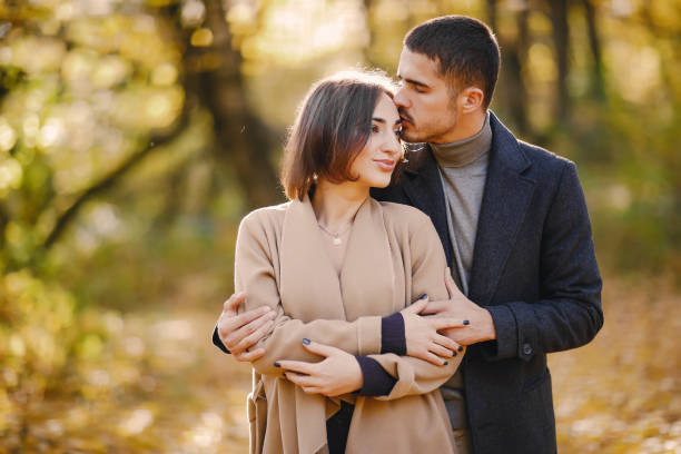 istock couple in the park 906520242