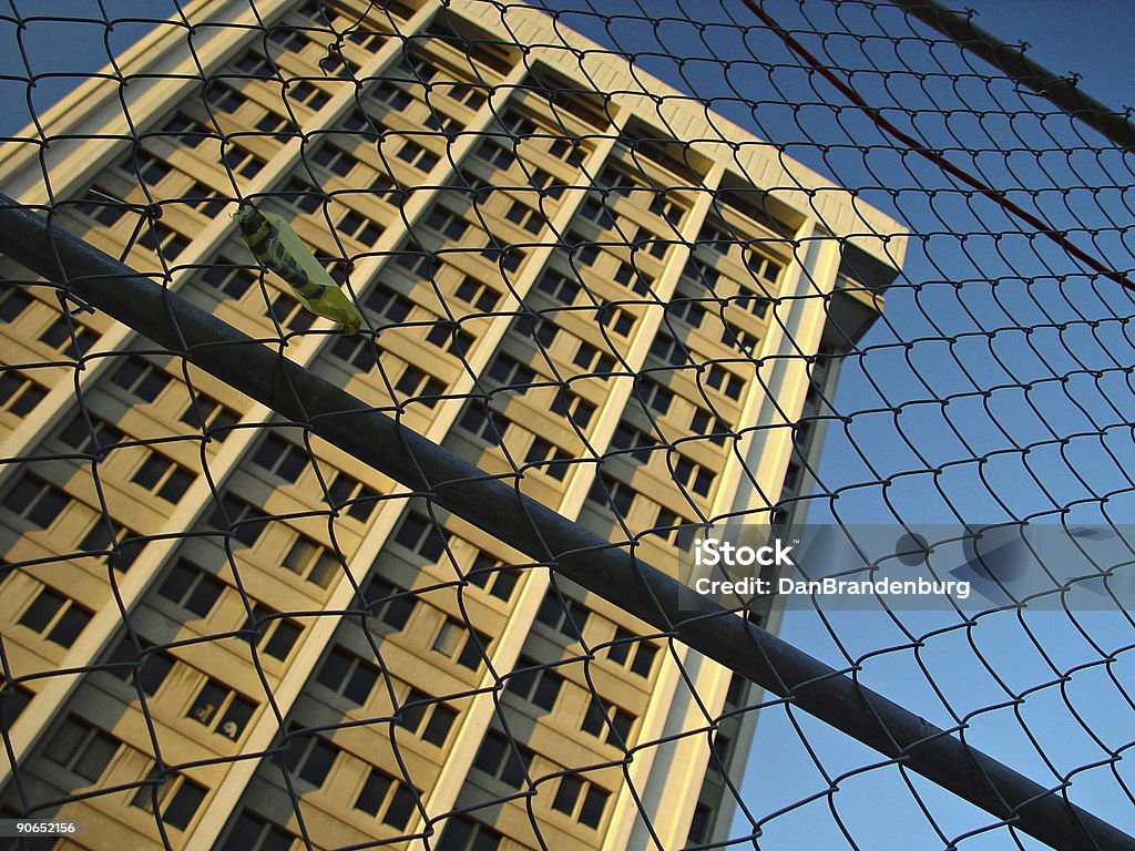 Stay Out Building fenced-in by chain link Architecture Stock Photo