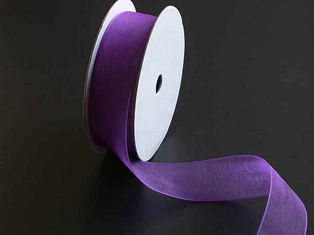 istock Purple Ribbon on a Black Background II 90653984