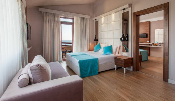 istock Luxury hotel Bedroom Interior with a Bed 906540140