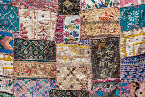 istock Detail of a old patchwork carpet 906540392