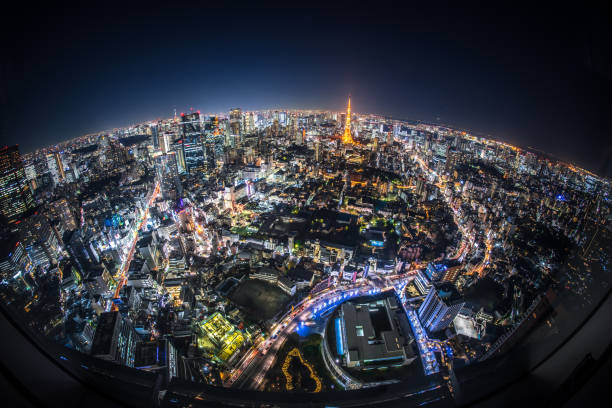 Fisheye View of Tokyo at Night Aerial view of crowded buildings in Tokyo. tokyo prefecture tokyo tower japan night stock pictures, royalty-free photos & images