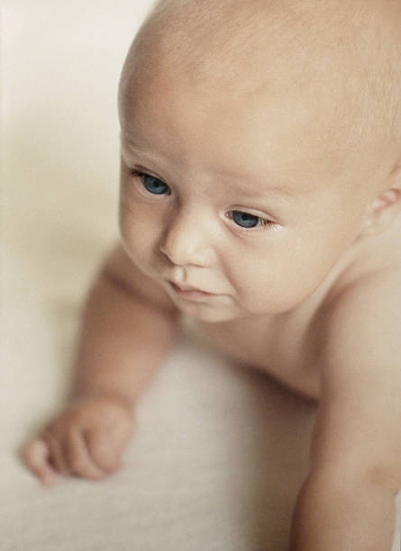 felix как ребенок - baby human eye blue toned image стоковые фото и изображения