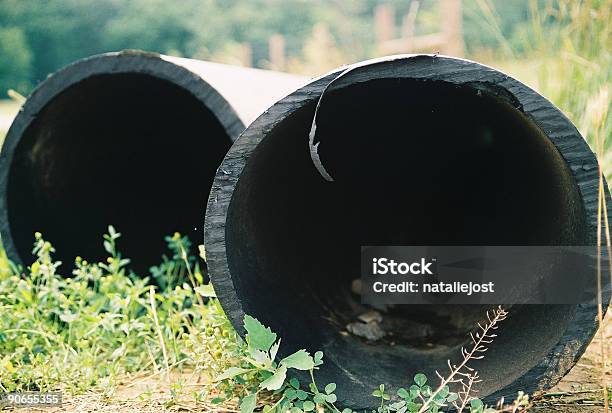 Two Tubes Stock Photo - Download Image Now - Agricultural Field, Black Color, Canal