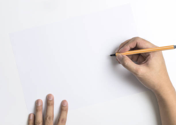 istock Hand writing on to a white copy space for text and massage banner 906556876