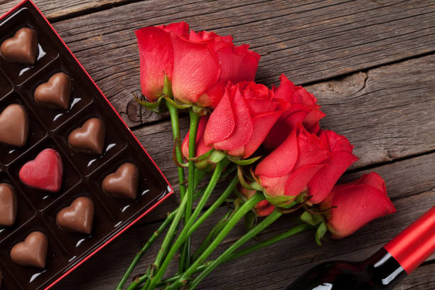 istock Valentines day with red roses and chocolate 906564596