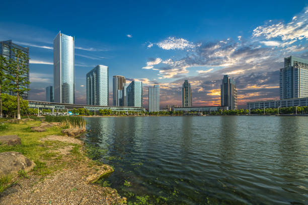 istock City Skyline By River Against Sky at twilight 906564612