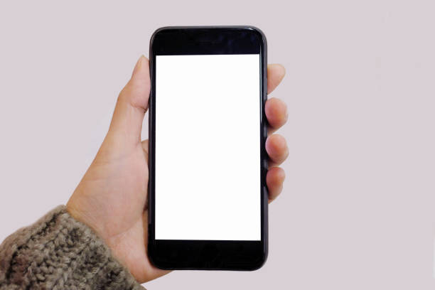istock the smart phone holding a woman hand, blank flame 906570010