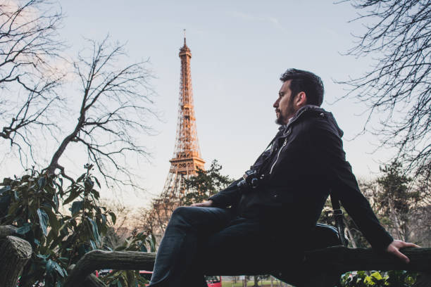istock Photographer relaxing in Paris 906570202