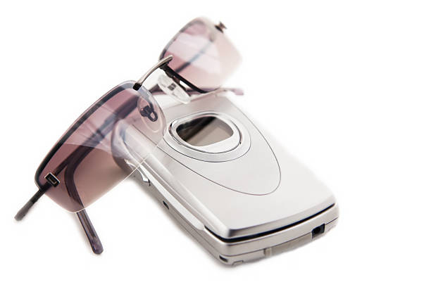 Cellular Phone and Sunglasses stock photo