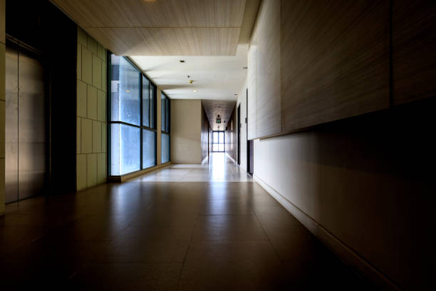 Empty futuristic glass and metal corridor. 3D generated image.