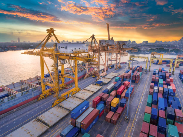 istock Logistics and transportation of Container Cargo ship and Cargo working crane bridge in shipyard 906577846