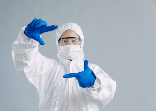 istock Asian female scientist hand frame, studio shot 906583088