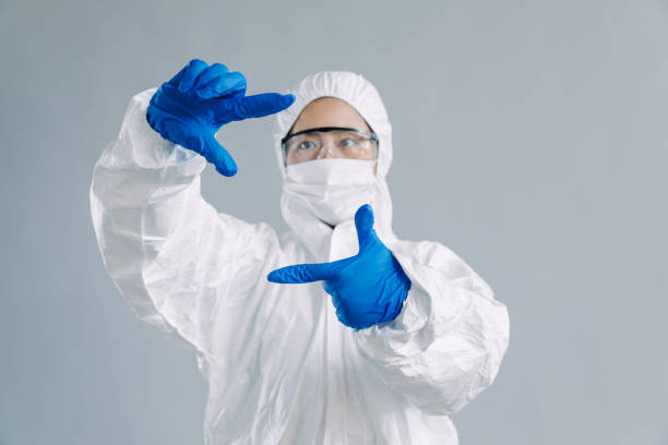 istock Asian female scientist hand frame, studio shot 906583102