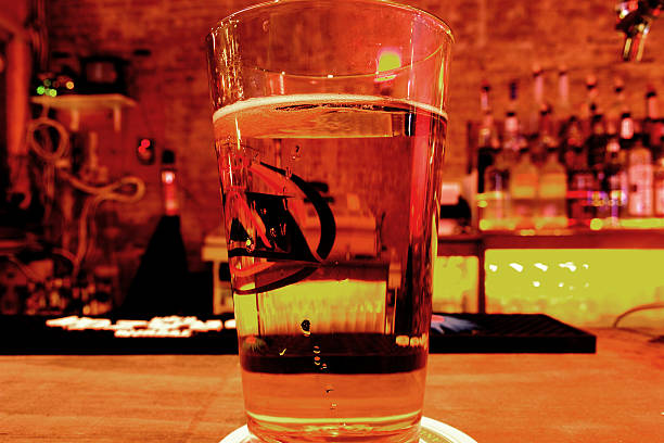istock Pint of Beer (Lager) on a Bar Counter - Close-Up 90658449