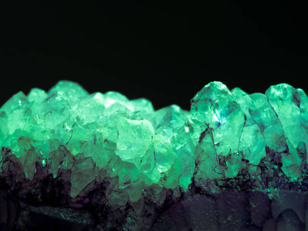 istock Green Amethyst on black background 906585860