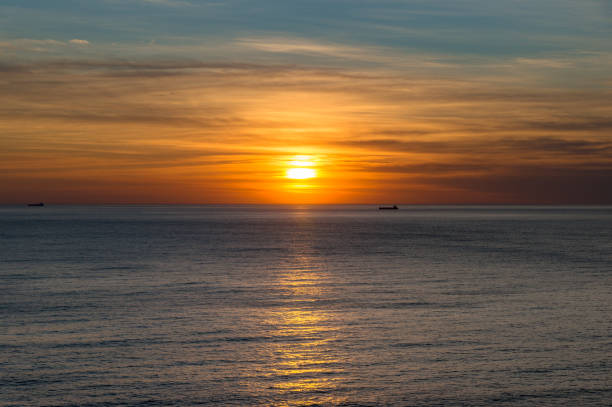 istock Bright sunrise, sunset landscape with ocean 906585862