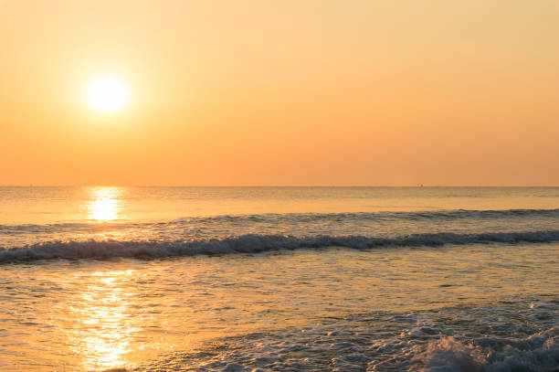 istock Colorful sunrise on tropical beach 906585906