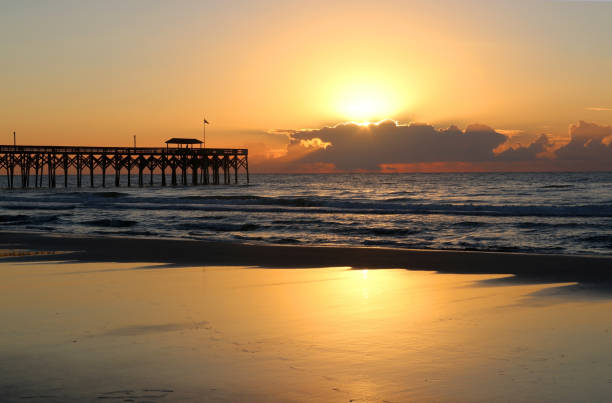 istock Golden sunrise over Atlantic ocean. 906588854
