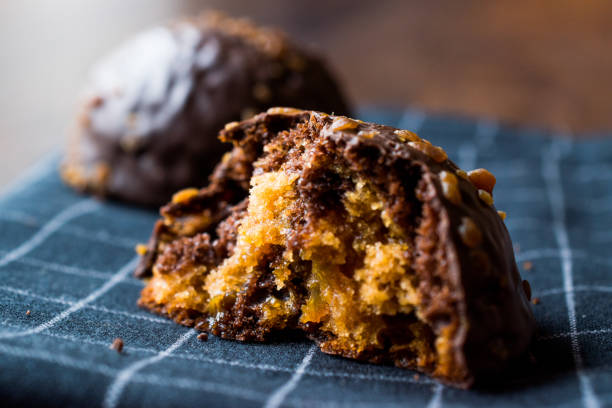 istock Bitten Chocolate and Caramel Ball Cake with Chestnut (Unfinished Dessert) 906591568
