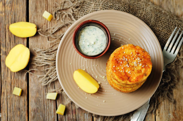 istock Mashed Potato Cheese Pancakes with Greek Yogurt Dill Sauce 906603154