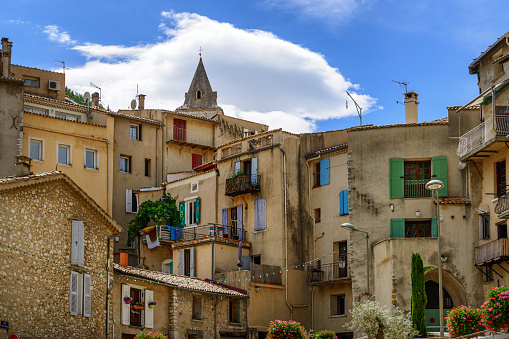 Old houses with colorful shutters on windows in Sisteron, Provence, France