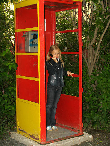 istock Little girl with mobile phone 90660562