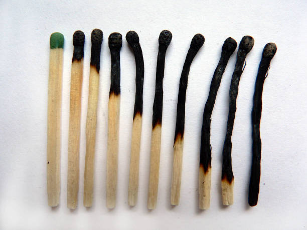 istock Line of new and burnt matches 90660679