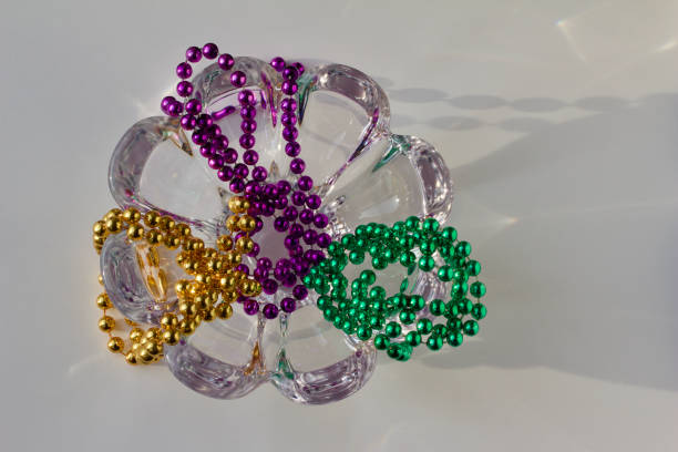 istock Traditional Three Color Mardi Gras Beads 906608702