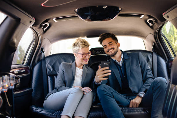 istock Happy young people in limousine 906612412