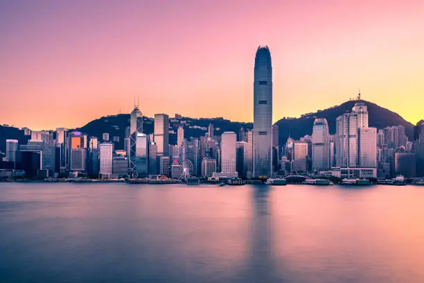 Photo of Victoria Harbor of Hong Kong at twilight