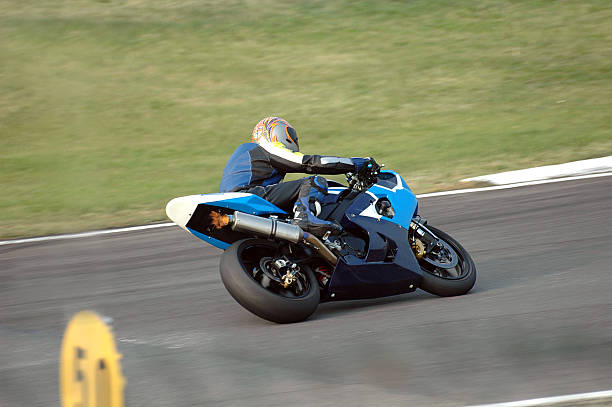 a person confidently riding a motorbike