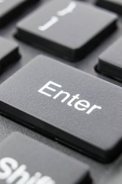 istock The dark enter key on the keyboard is close-up. 906618942