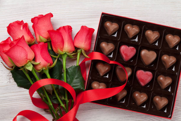istock Valentines day with red roses and chocolate 906621836