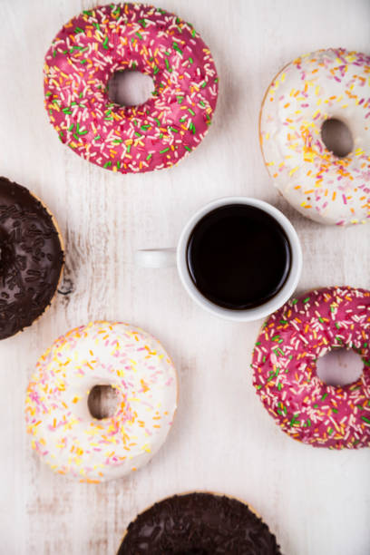 istock Donuts and a cup of coffee 906631840