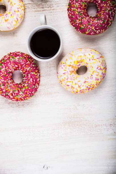 istock Donuts and a cup of coffee 906631976