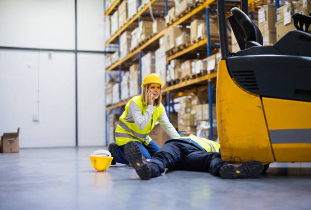 istock An injured worker after an accident in a warehouse. 906632078