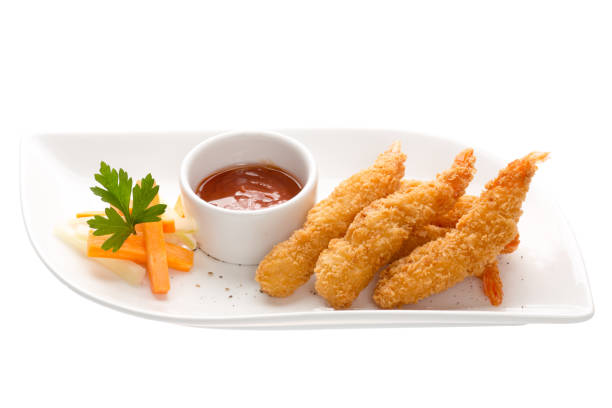 istock Shrimp in batter with vegetables isolated 906634940