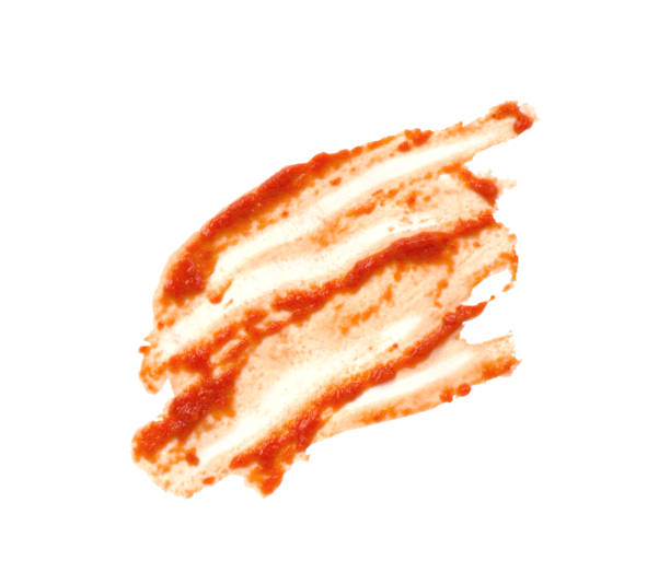 istock tomato sauce isolated on white background 906641860