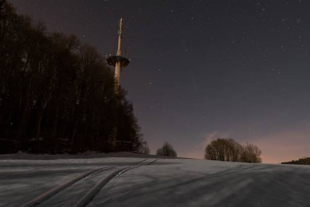 radio mast in liebersberg near grafenau in a full moon winter night, bavarian forest, germany - full moon audio imagens e fotografias de stock