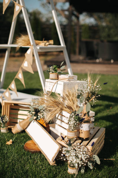 istock Closeup shot of the rustic wedding decoration elements  at daylight 906648270